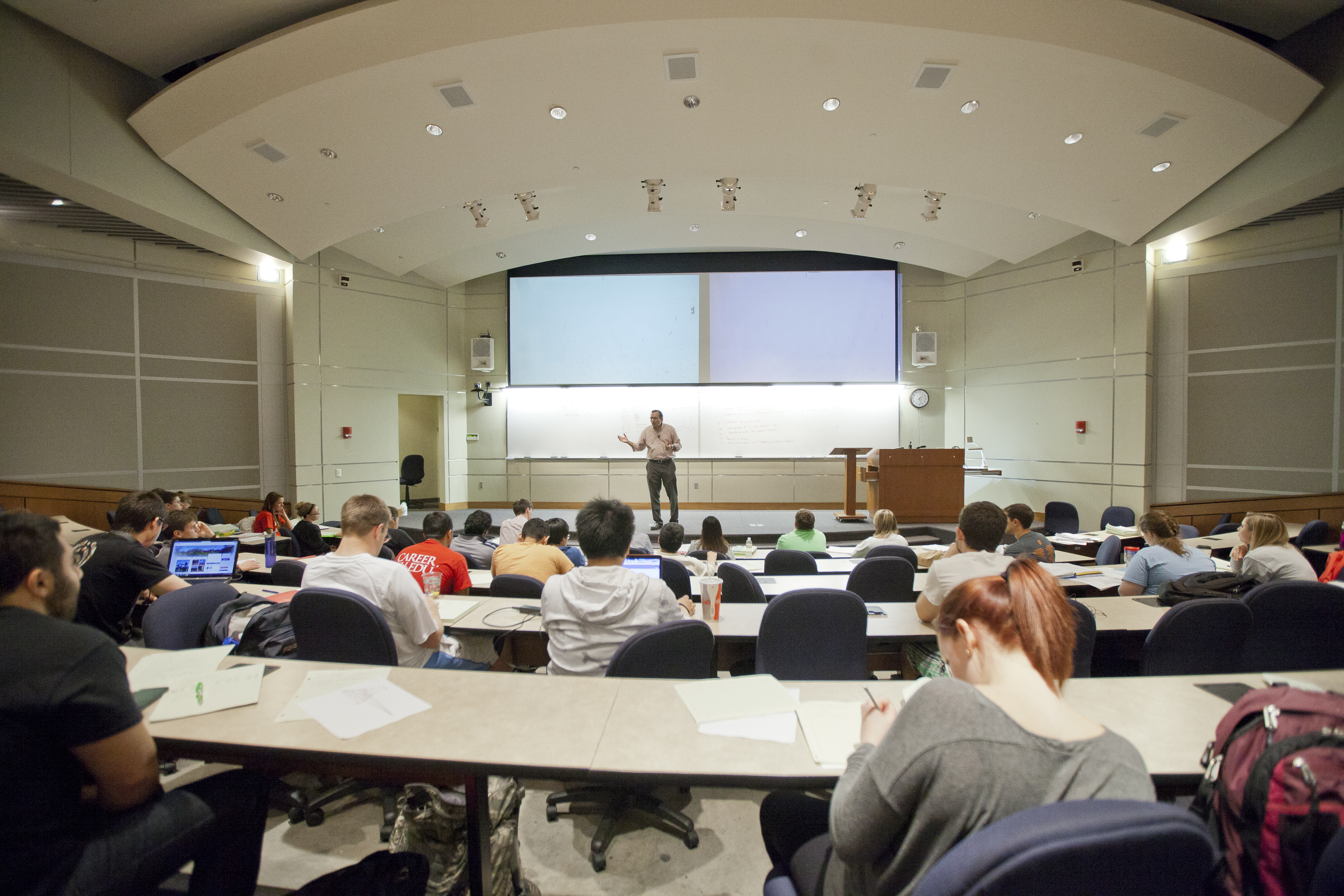 An instructor lectures in an Eaton Hall classroom