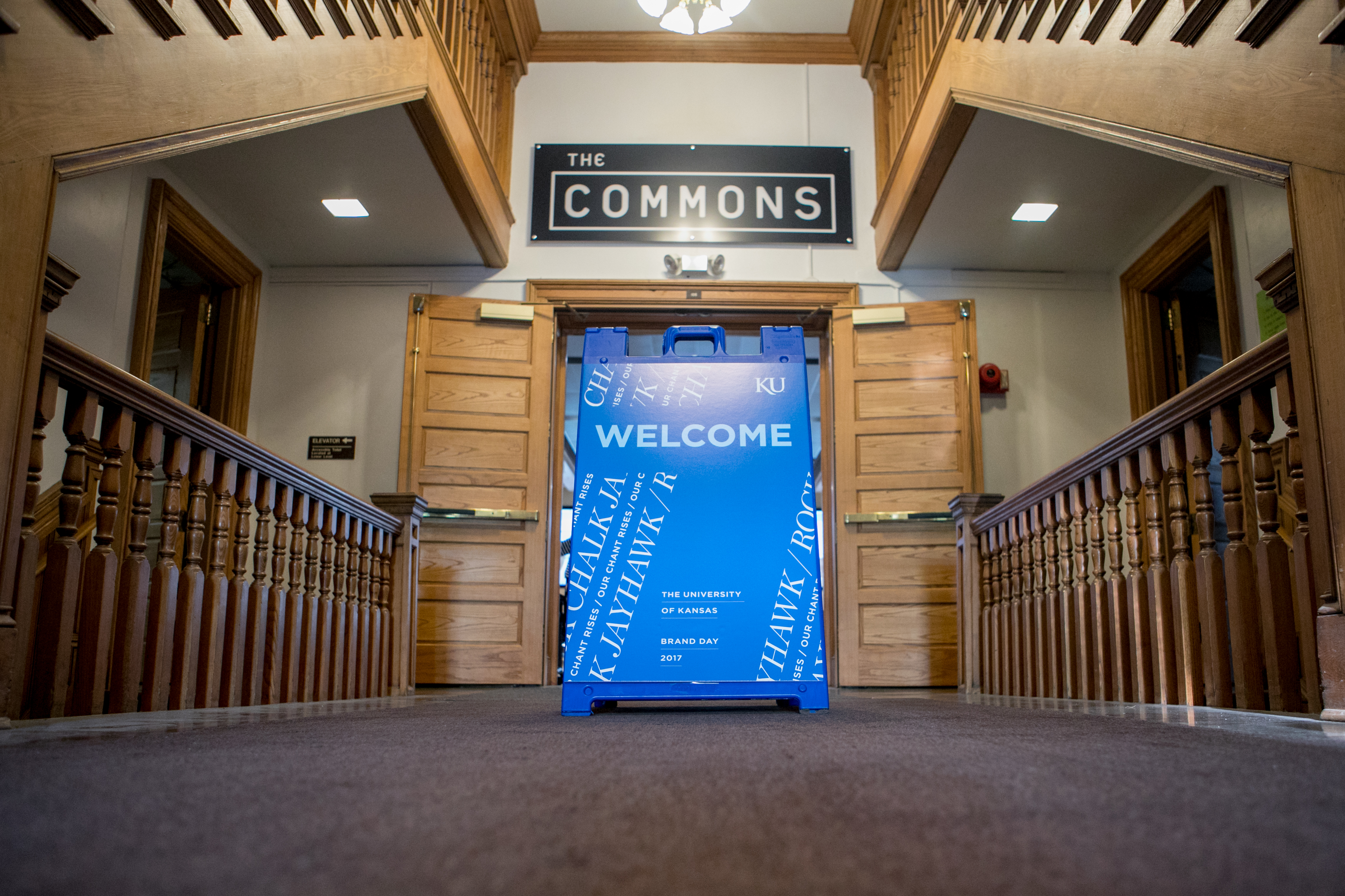 A welcome sign in front of the Commons entrance