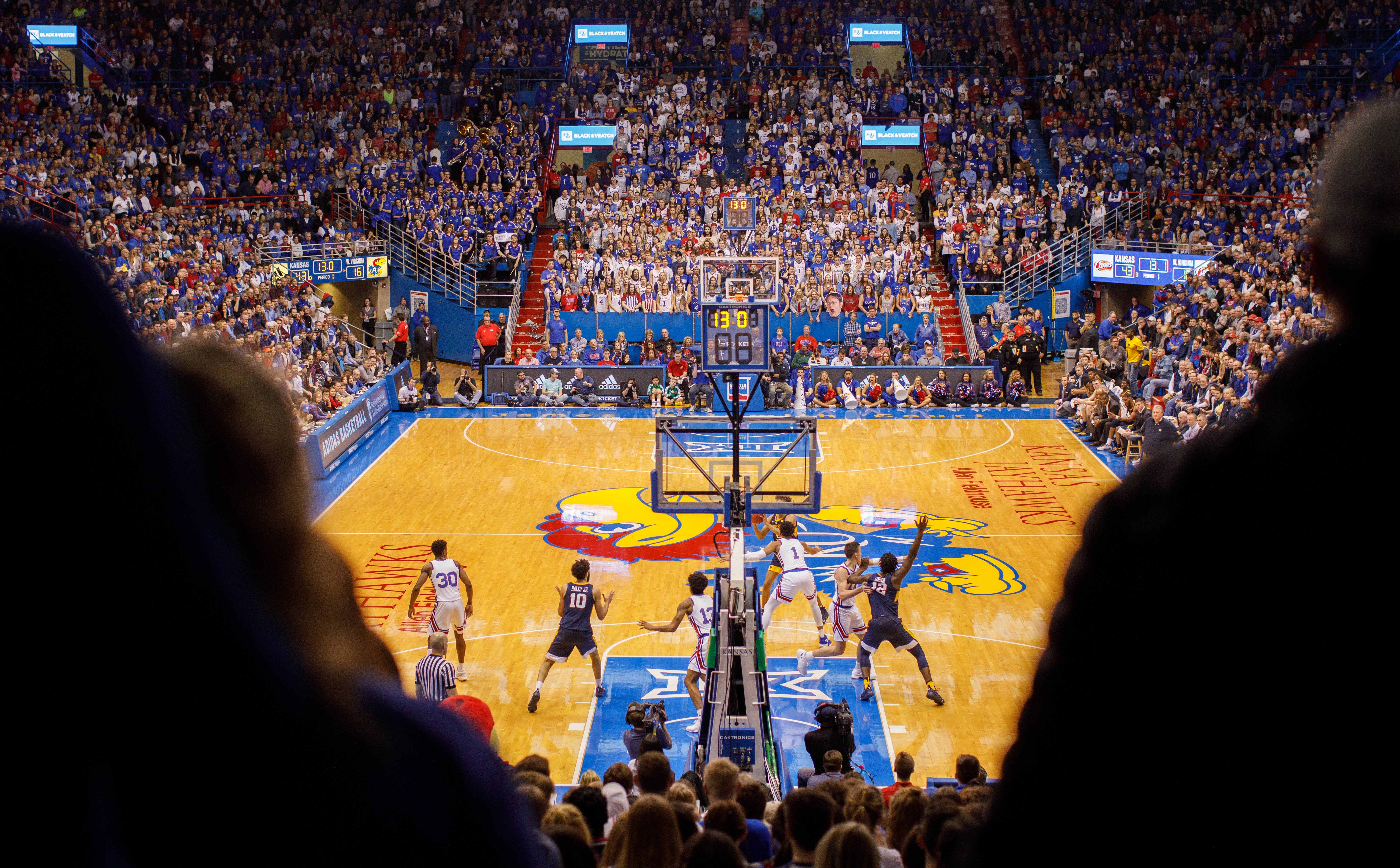 KU men’s basketball team playing on the court at Allen Fieldhouse