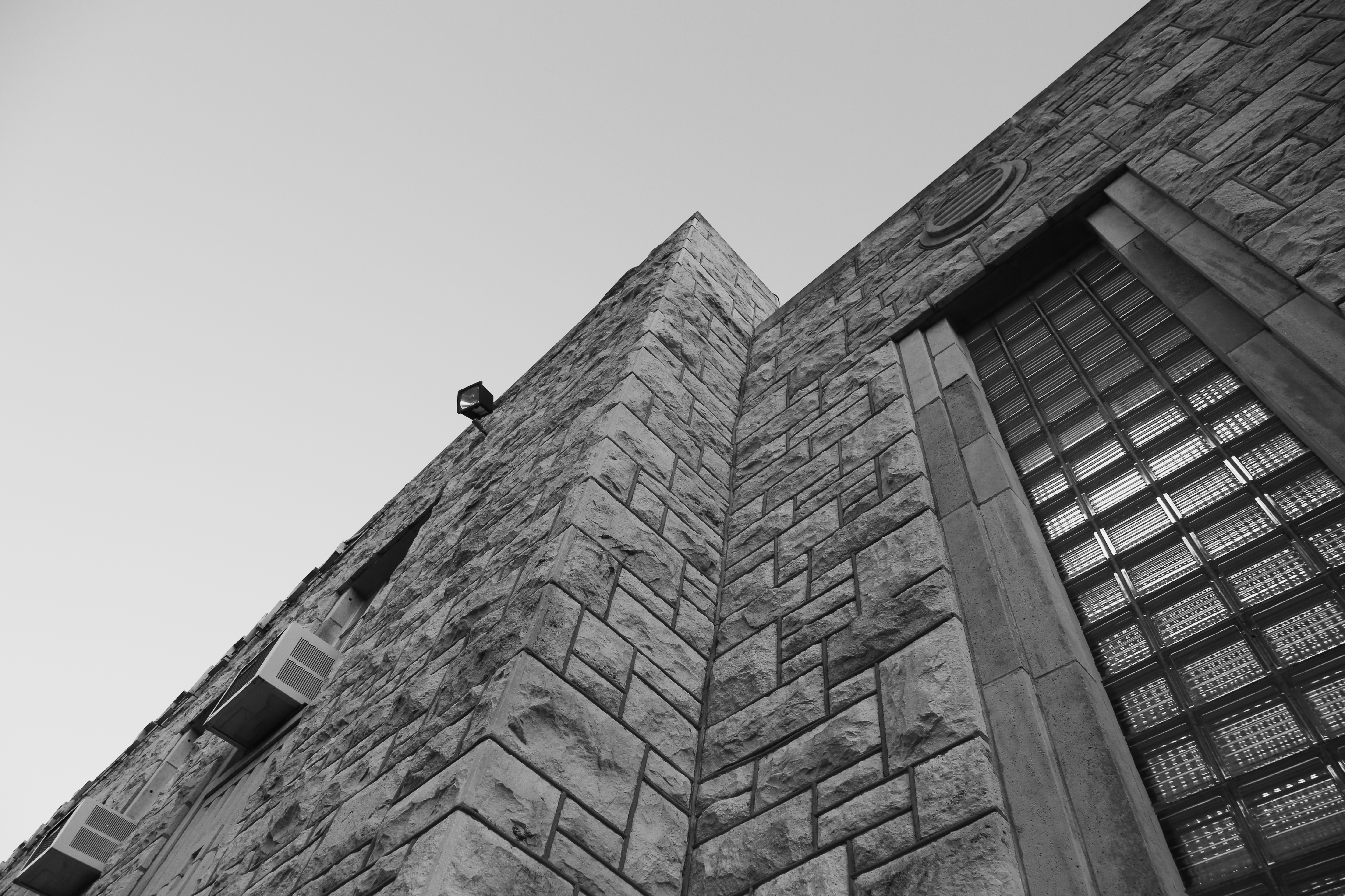 Black and white detail shot of the Military Science Building’s limestone façade