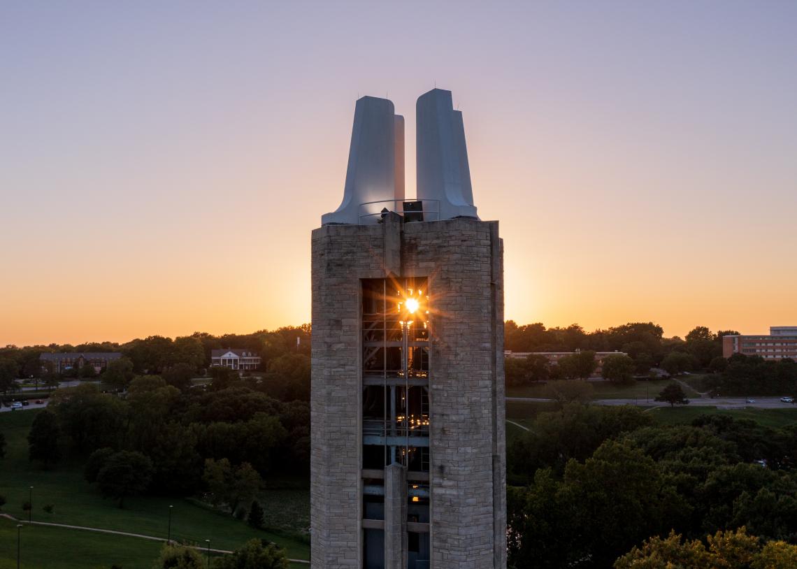 Sunset peeking through the top of the Campanile on KU’s Lawrence campus