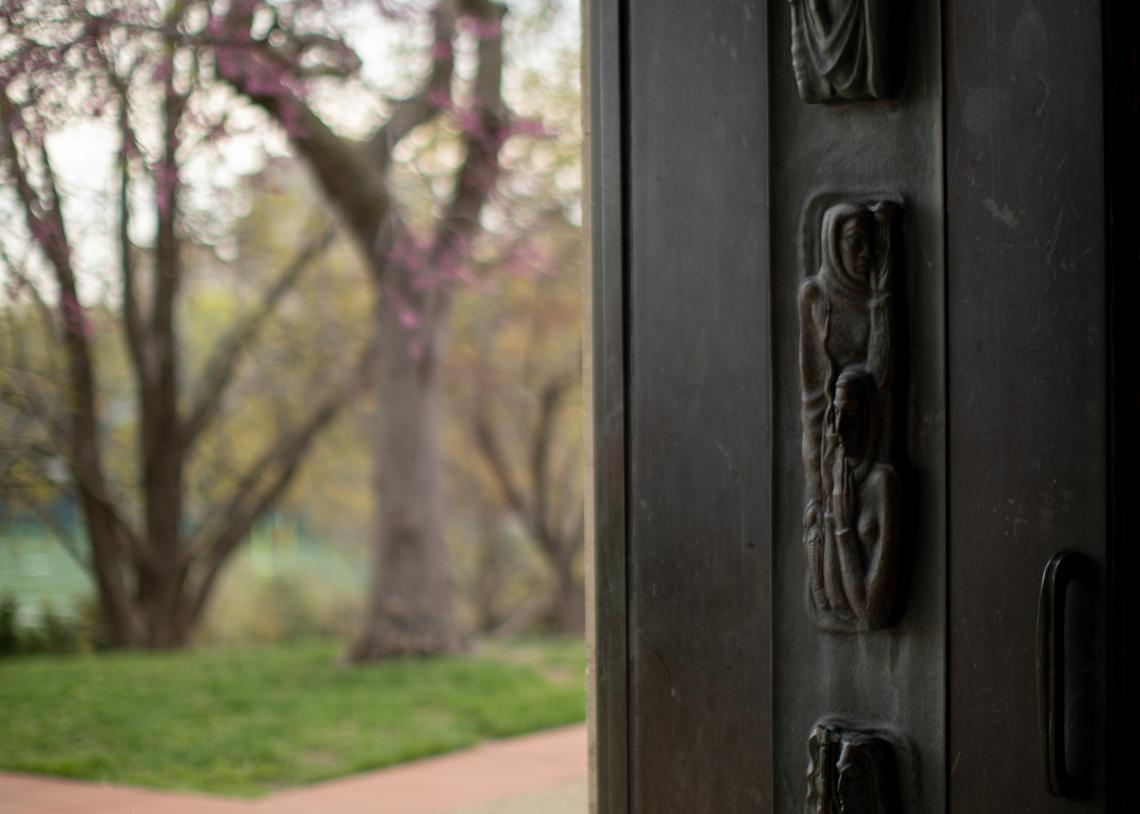 Close-up of KU Campanile door sculptures