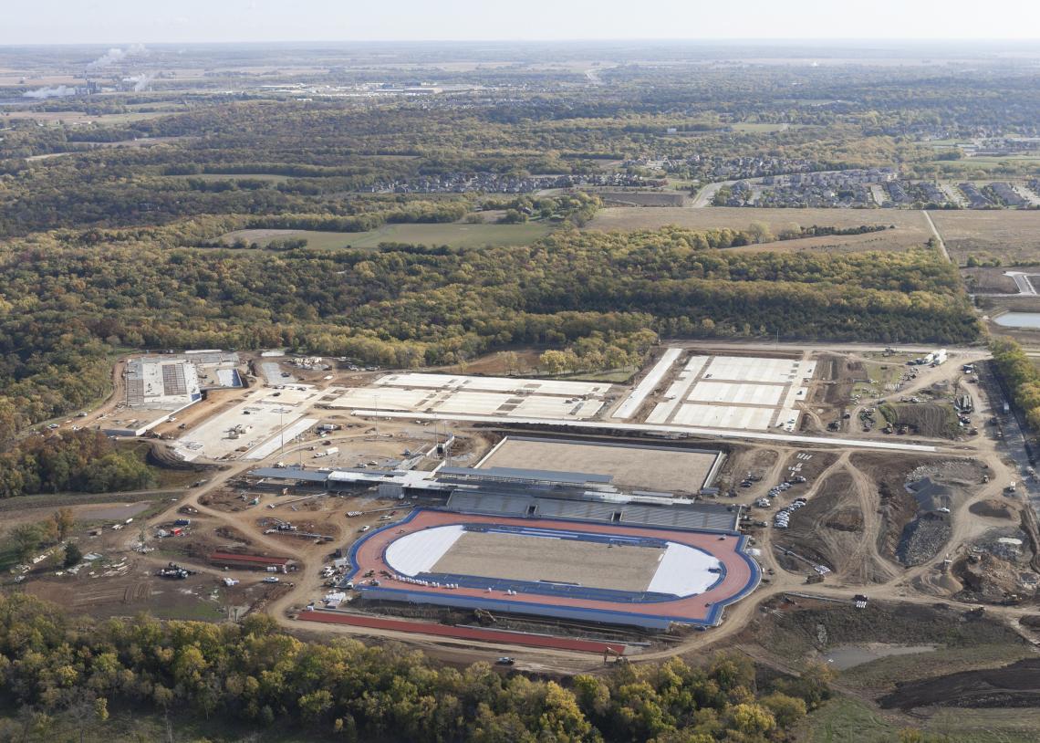 Aerial view of the track, courts, and facilities at Rock Chalk Park