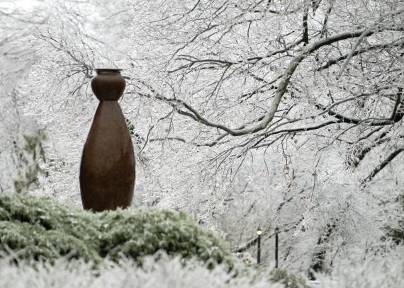 The Water Carrier sculpture on a winter day