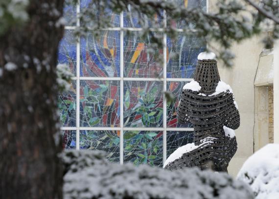 o	The back of Elden C. Tefft’s “Moses” sculpture, covered in snow and facing Smith Hall’s Burning Bush stained glass window on KU’s Lawrence campus