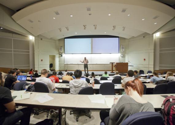 An instructor lectures in an Eaton Hall classroom