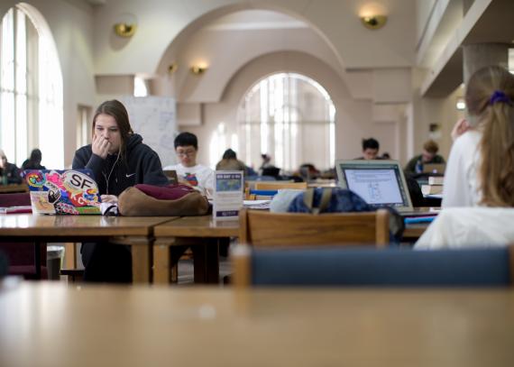 students working at tables in Anschutz Library
