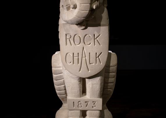 A Dyche Hall grotesque featuring the chant “Rock Chalk.”