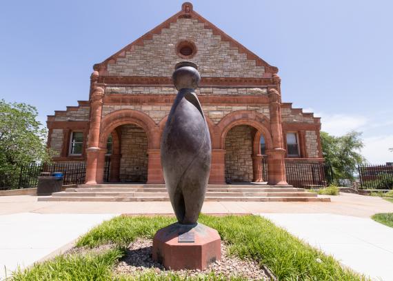 The Water Carrier sculpture, which signifies the importance of water to all living things, sits in front of Spooner Hall