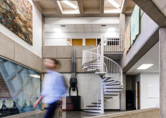 A man walks inside the Nunemaker Center on KU’s Lawrence campus