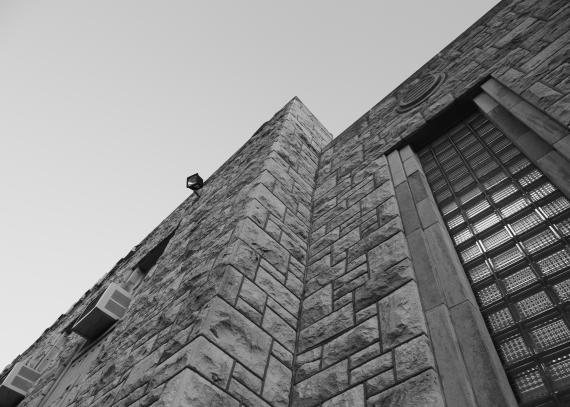 Black and white detail shot of the Military Science Building’s limestone façade