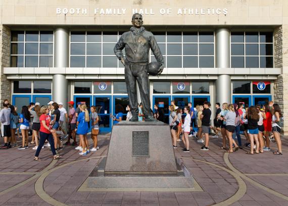 Students behind The Phog Allen statue during a game day